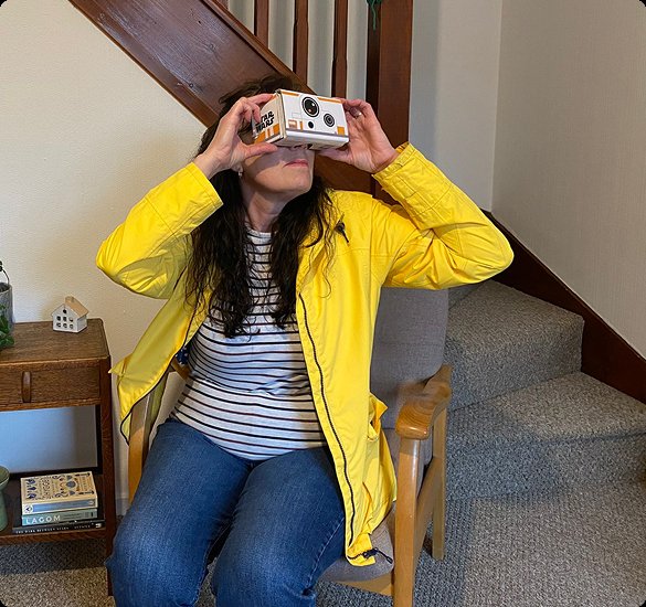 Participant testing NAVLINGO on a Google Cardboard headset